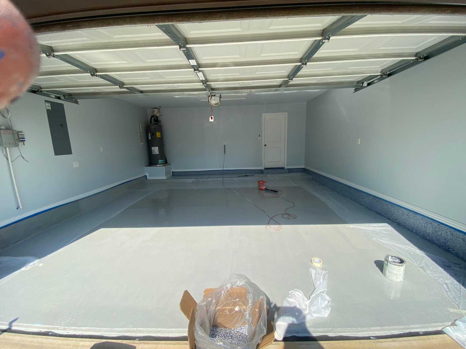 Garage floor epoxy grey in progress