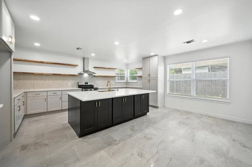 Modern white kitchen with floating shelves